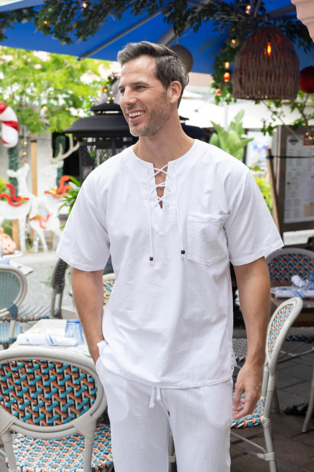 Man in white shirt with drawstrings