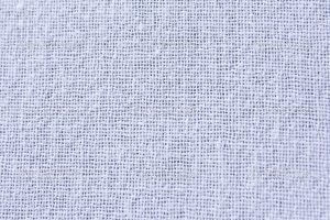 White cotton fabric textile texture to background