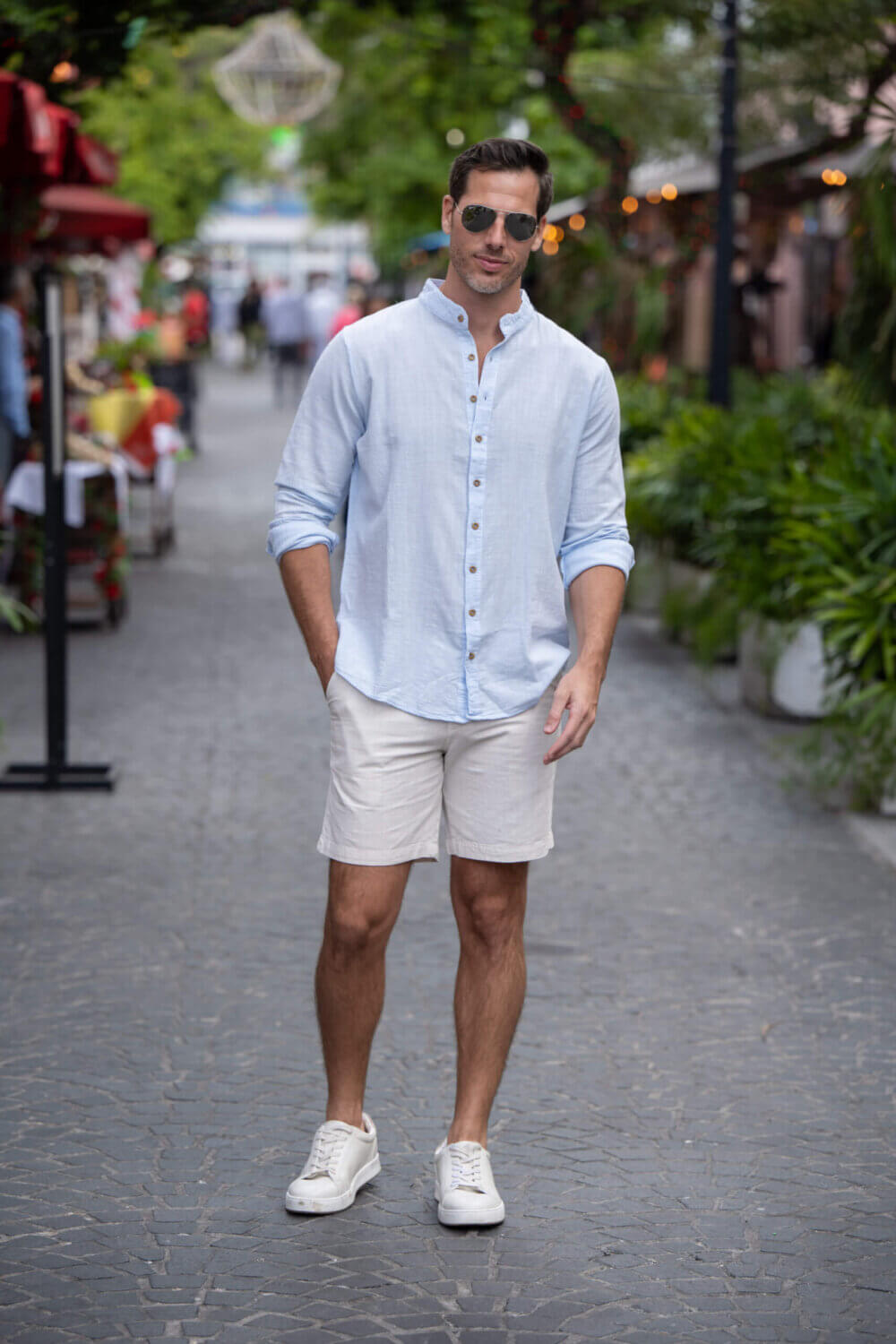 Man in light blue long sleeve