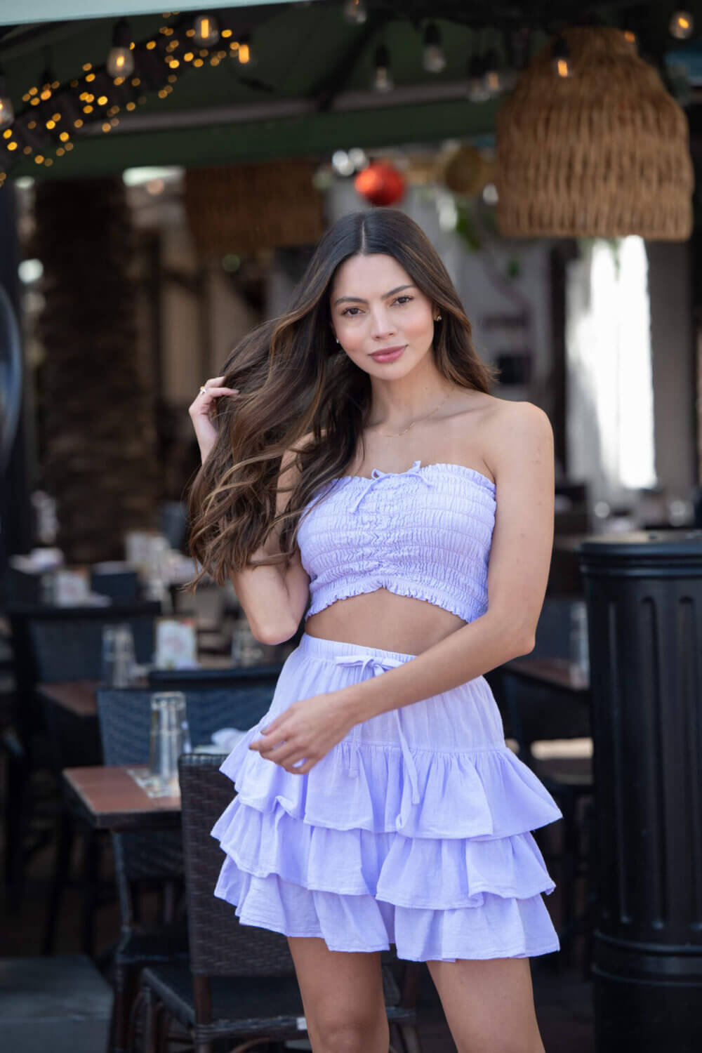 Women in lilac top