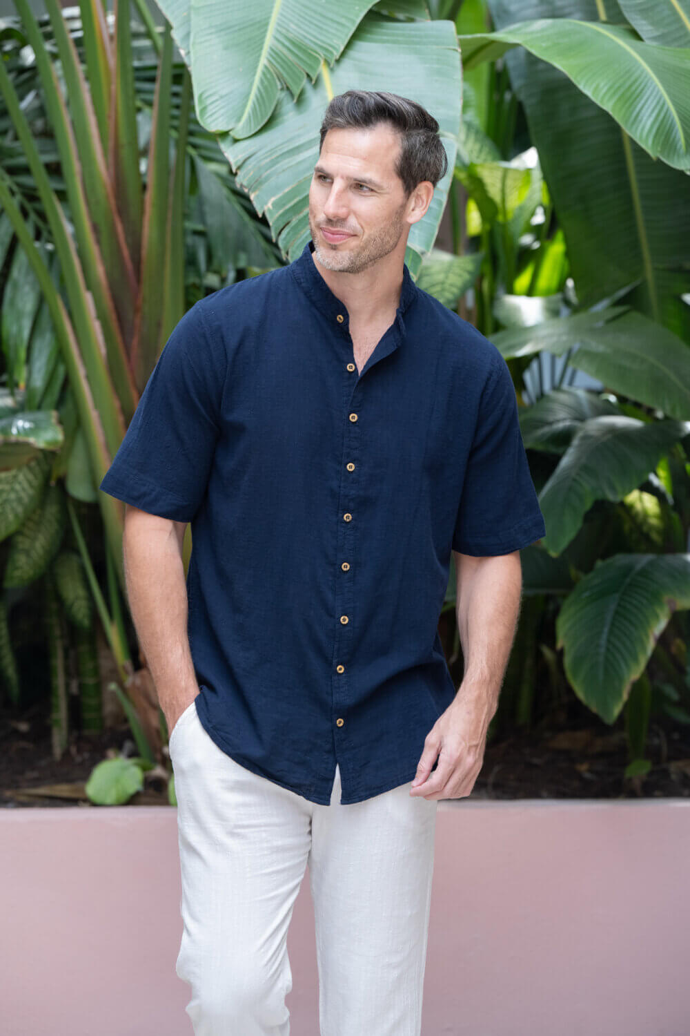 Man in dark blue button down shirt