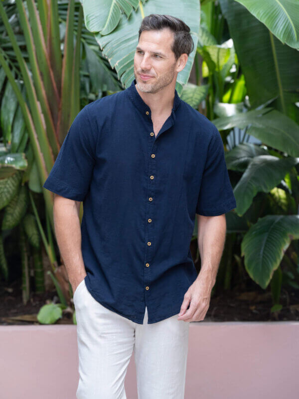 Man in dark blue button down shirt